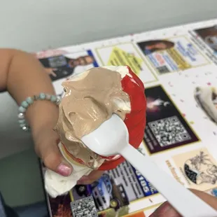 Kids size twist soft serve dipped in cherry