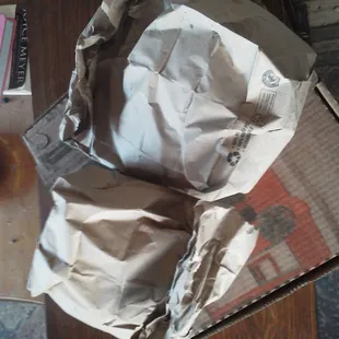 Plain paper bags for takeout. No store information on them.
