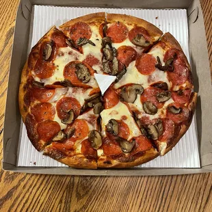 Pepperoni and mushroom pizza