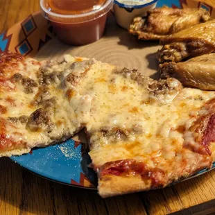 14" pizza with meatball and extra cheese and wings (sauce on the side)