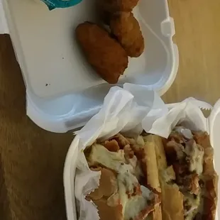 Chicken parm sandwhich and jalapeño poppers! So good!