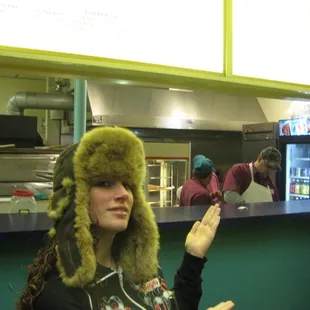 Jenna C. displays the delicious menu in her winter cap.