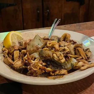 Fishy, disgusting "grilled" calamari drenched in vinegar