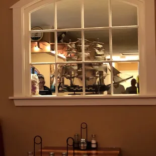 a model of a ship in the window