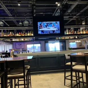 a bar with a television