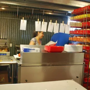 a man working in a commercial kitchen