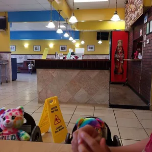 Chicken enchiladas with rice and beans,