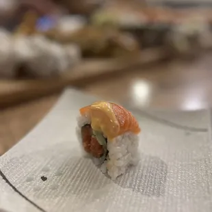 a sushi roll on a napkin