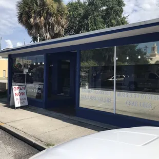 a car parked in front of the store