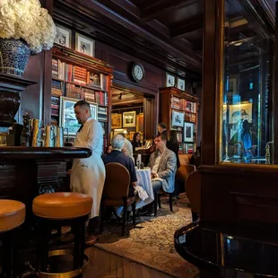 people sitting at a bar