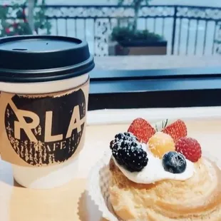 a pastry and a cup of coffee