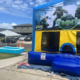 Large bounce house with TMNT theme