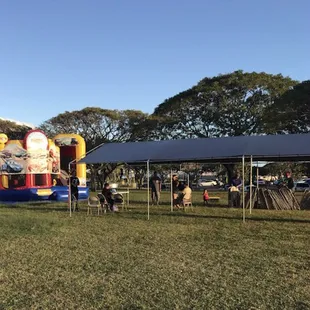 Party Pkg B5: 20x30 Tent, 9 Tables, 75 Chairs &amp; C5 Combo Bouncer
