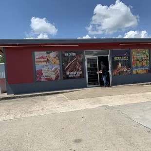 a man entering a restaurant