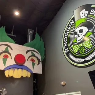 a clown face on the wall