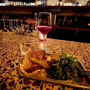 Chona red wine and a brie grilled cheese with side salad.