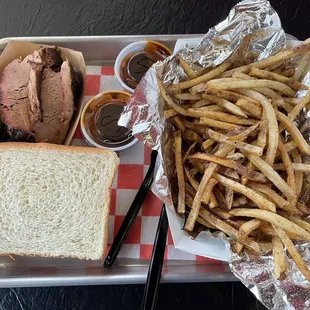 Brisket "sandwich" with smoky sauce and fries