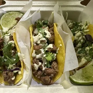 Steak tacos and one garlic shrimp tacos