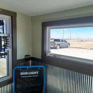 a sign in front of a window