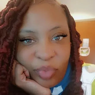 a woman with dreadlocks