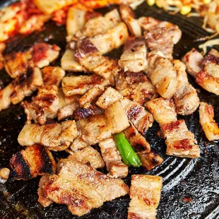 a close - up of the meat on the grill