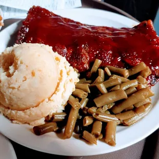 1/2 Slab of House Smoked Ribs with your choice of 2 Sides $10.50! Homemade Mashed potatoes!