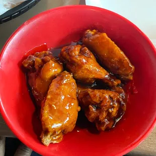 a bowl of chicken wings