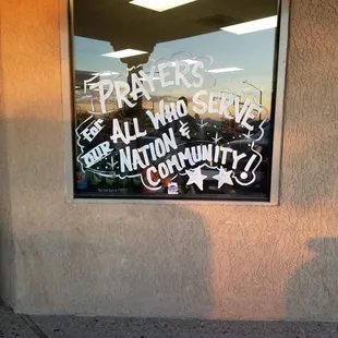 a sign in the window of a store