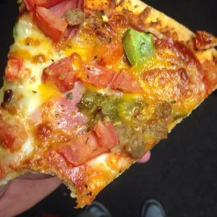 Roadrunner sells individual slices; one topping is only $1! Be sure to check out slices menu for good combos. Wings, salad, etc!