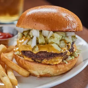 a hamburger and fries on a plate