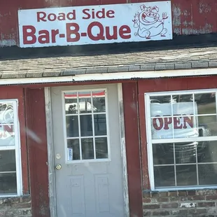 Front door and sign.