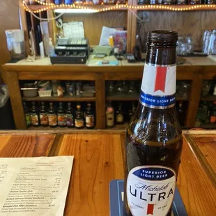 a bottle of beer on a table
