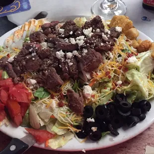 $9.95 black and blue steak salad is very large.