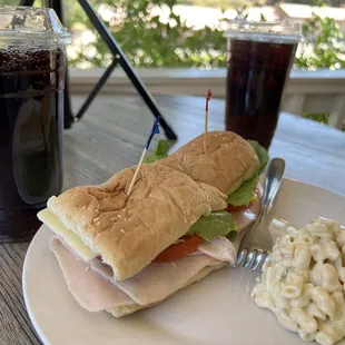 a sandwich and macaroni salad