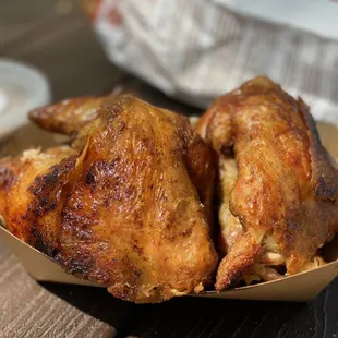 a basket of chicken on a table