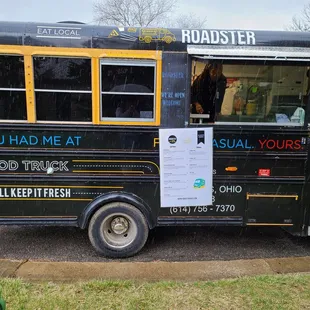 a black and yellow school bus