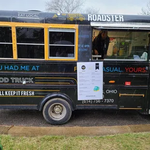 a black and yellow school bus