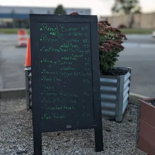 a blackboard with a list of items on it