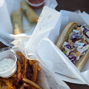 BL: cheese rolls FL: loaded fries RT: road dog