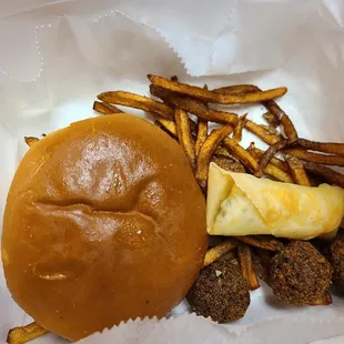 Lebanese Burger with fries, falafel balls, and 1 cheese rolls!