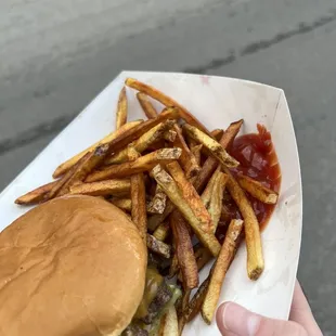 Triple Smash Burger with Fries and Ketchup.
