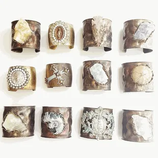 Cuffs and bracelets made with natural stones and fossils.