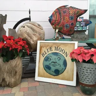 Real globes, vintage windows, candles and fish lantern.