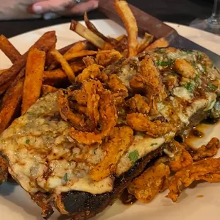 Black n Blue strip with Cajun seasonings. Cooked perfectly, lots of great flavors. Fries perfectly cooked as well.  A great plate of food.