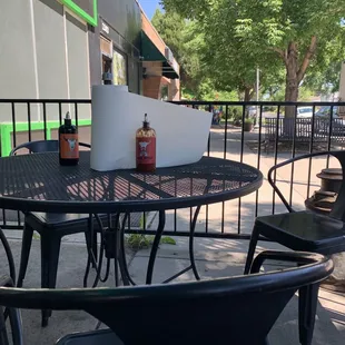 a table and chairs on a patio