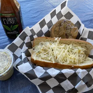 Brat &amp; Kraut Haus Special Dog, Haus Coleslaw and home made chocolate chip cookies.