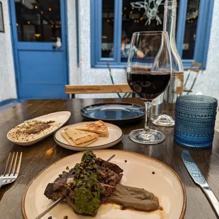 Lamb skewer on lentil puree with (spicy) zhug sauce.  Van Ardi, Areni, Armenian red wine