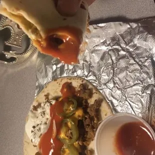 Delicious juicy soft tacos were you can add up to 15 different toppings for your tacos, burgers or loaded fries. So delicious