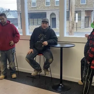 A few hardworking locals who love to eat at RoamingMeals. We now have inside tables and booths to eat at and outside table eating. Stop by.