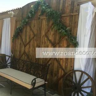 A rustic wedding scenary setup of wooden decorative barn doors. Decoration done by ROAN.